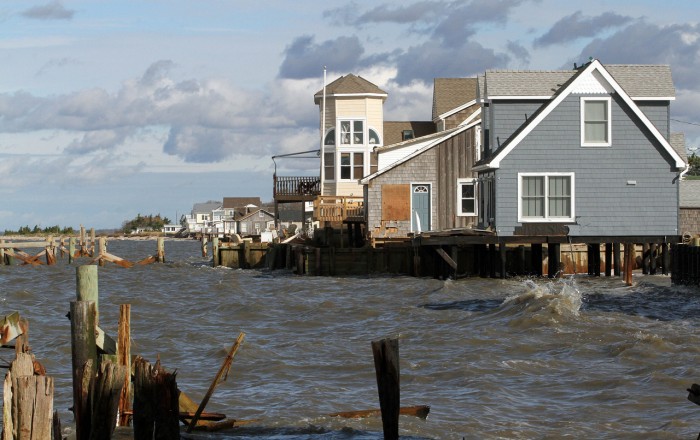 Damaged homes on South Beach Ave on the Delaware Bay